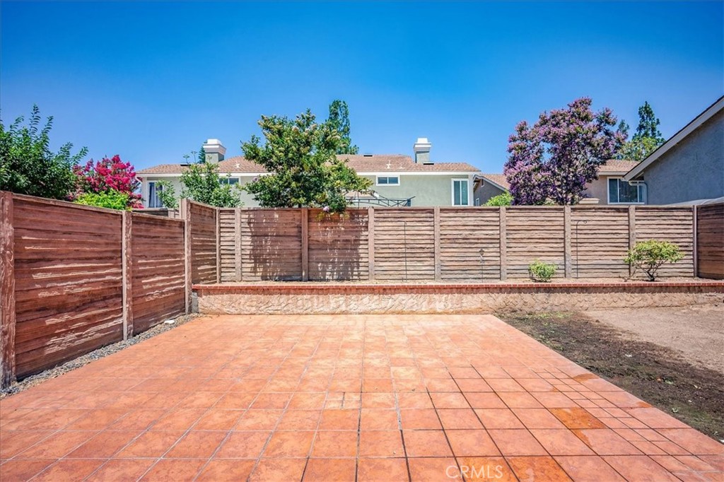 629 Calaveras Road San Dimas, CA 91773 - Photo 44 of 49 a view of a house with a backyard