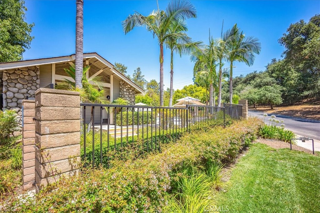629 Calaveras Road San Dimas, CA 91773 - Photo 45 of 49 a view of a garden with a slide