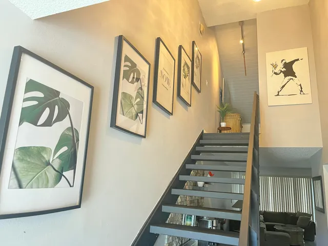 a view of an entryway with wooden floor