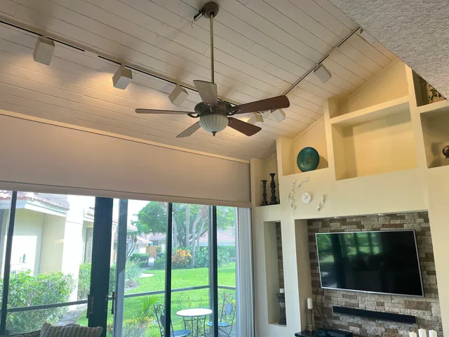 a ceiling fan in a room