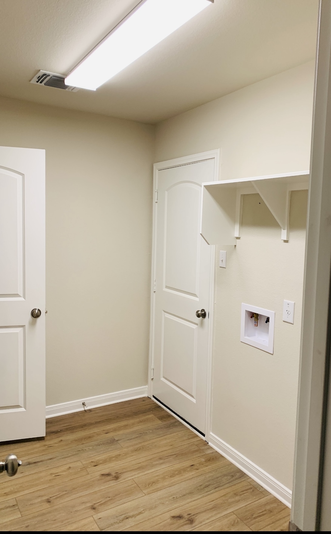 808 Fallbrook Drive Temple, TX 76502 - Photo 26 of 36 Laundry area with hookup for a washing machine and light wood-type flooring