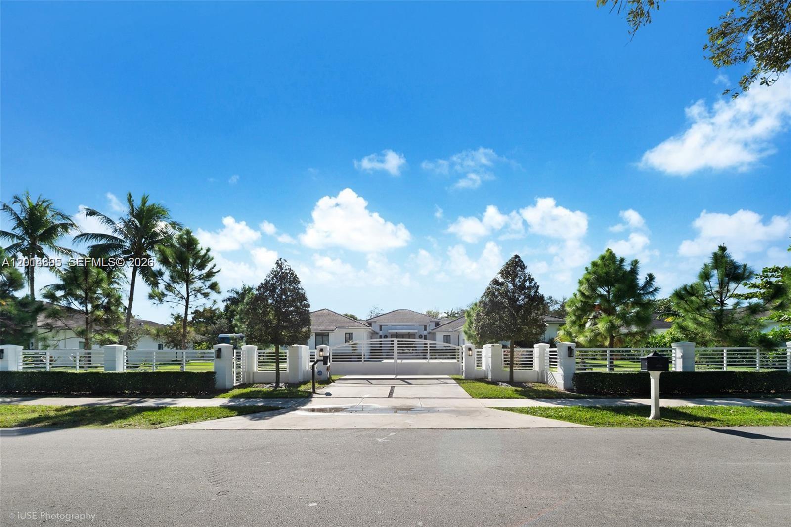 7830 Southwest 117th Street Pinecrest, FL 33156 - Photo 1 of 24 a view of a playground with basketball court