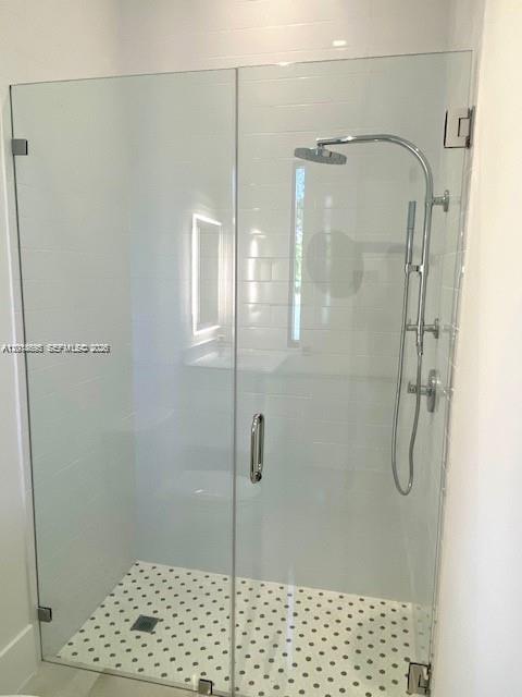 7830 Southwest 117th Street Pinecrest, FL 33156 - Photo 15 of 24 a bathroom with a shower