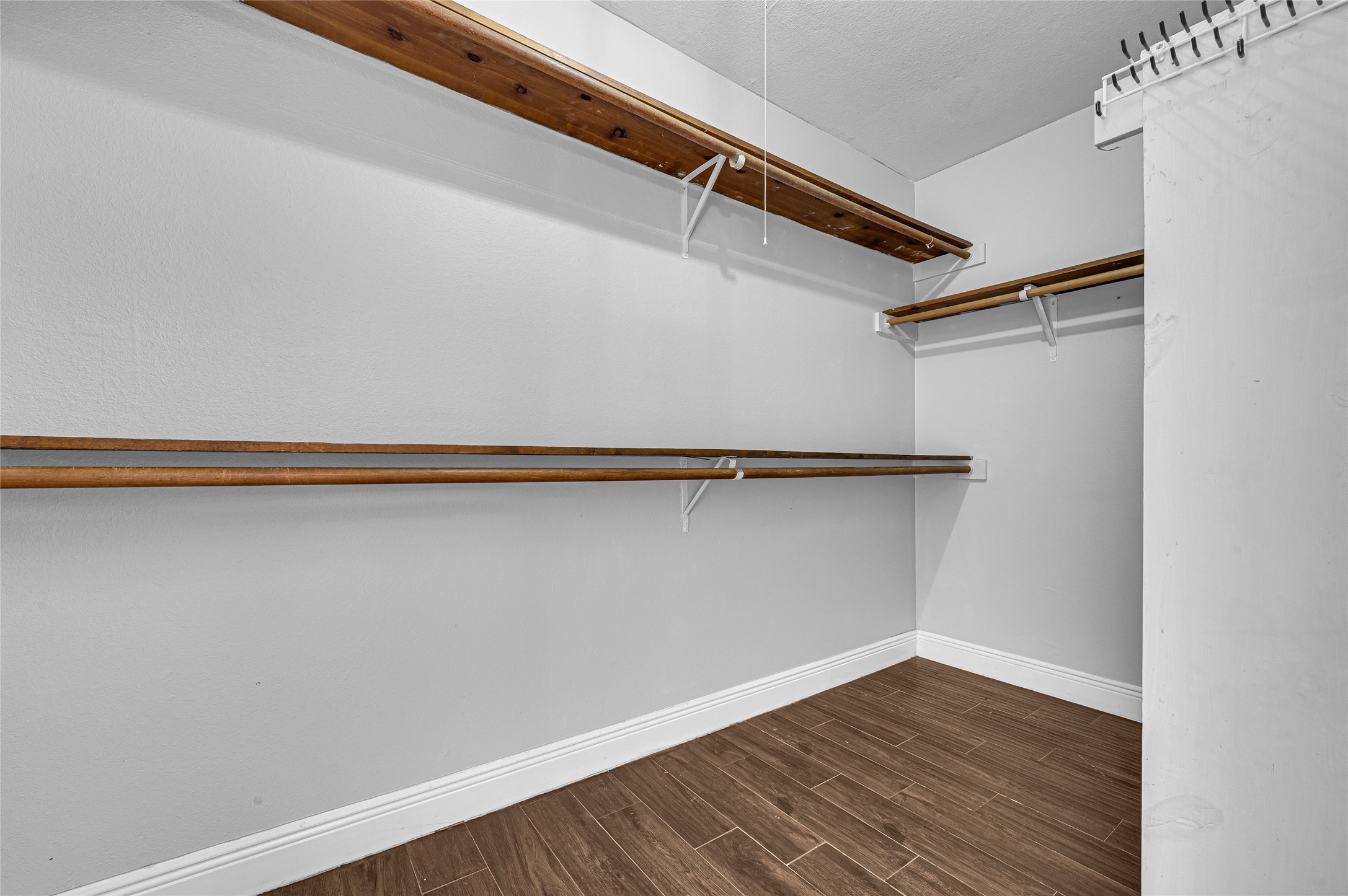 4170 Amir Street Houston, TX 77072 - Photo 15 of 18 a view of a room with wooden floor