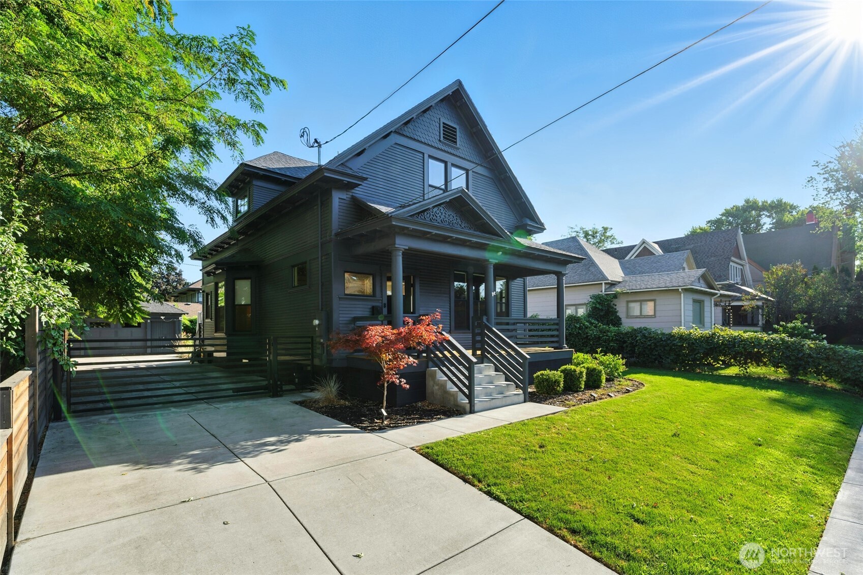 531 Newell Street Walla Walla, WA 99362 - Photo 2 of 38 a front view of a house with a yard table and chairs