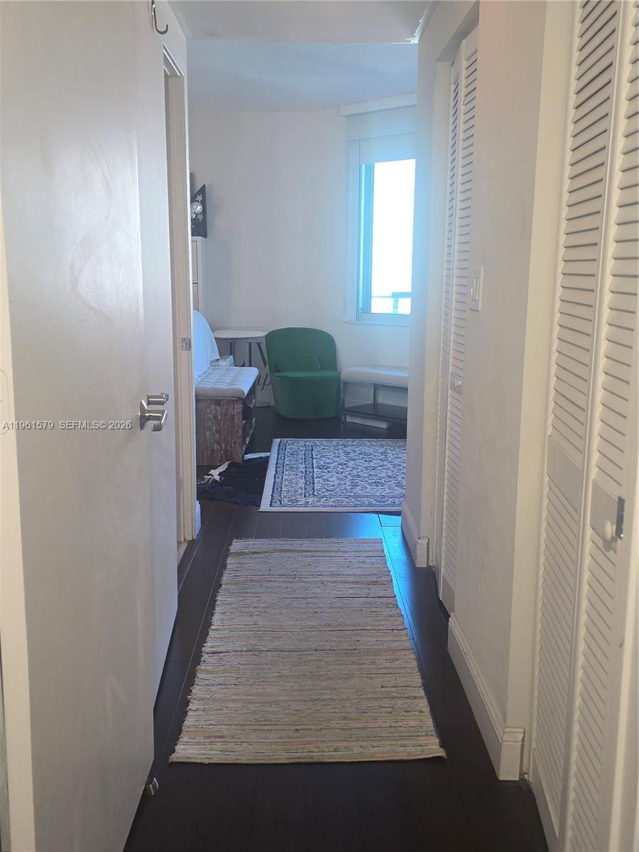 335 South Biscayne Boulevard, Unit 3400 Miami, FL 33131 - Photo 26 of 52 a view of a bedroom from the hallway