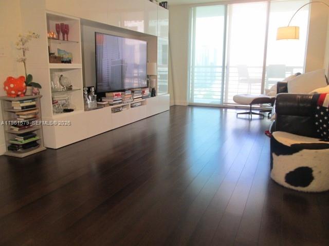 335 South Biscayne Boulevard, Unit 3400 Miami, FL 33131 - Photo 40 of 52 a living room with furniture and floor to ceiling window
