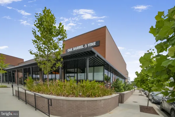 a view of a house with a tub and flower plants