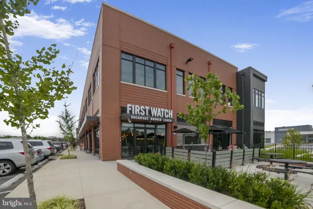 a view of a building with a street