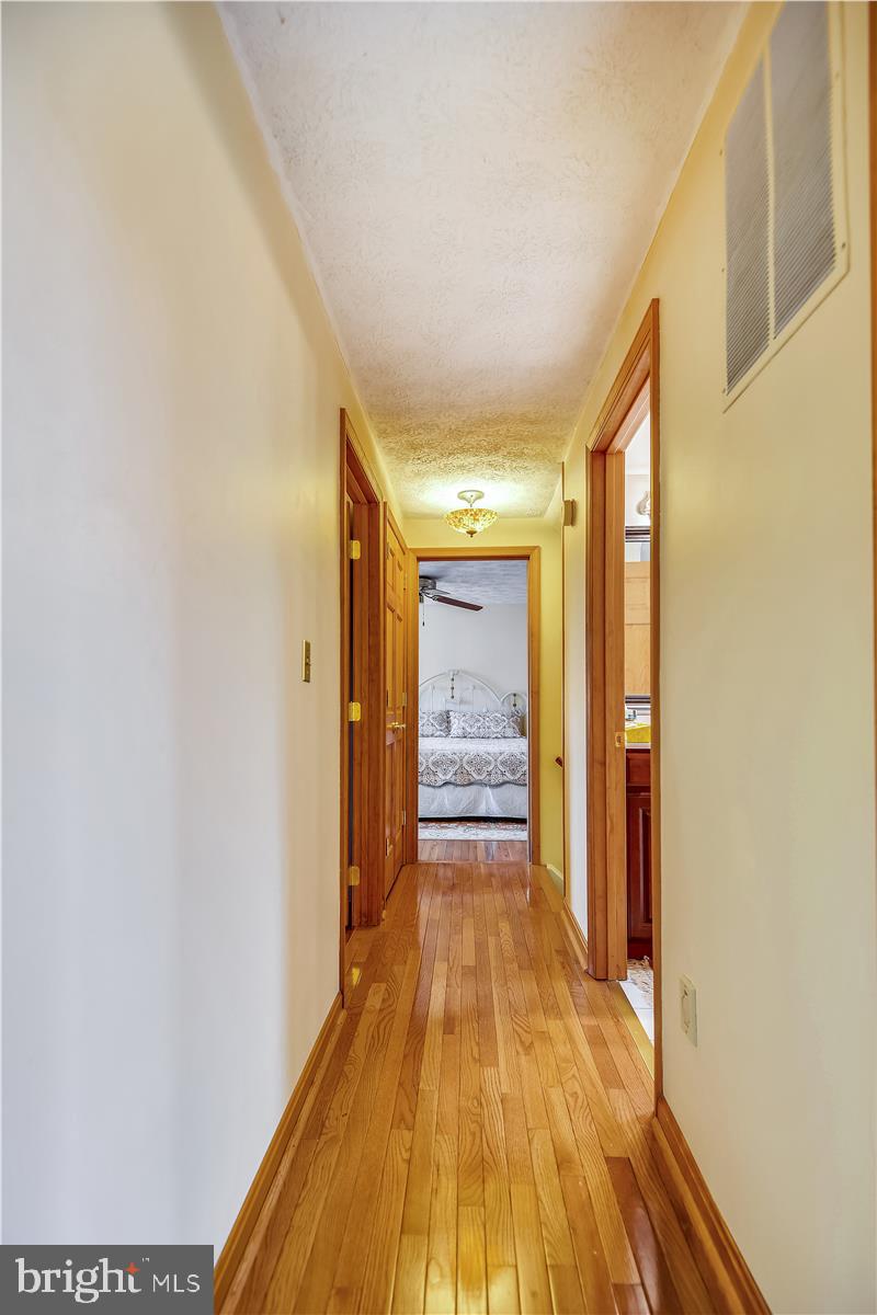 7718 Harmans Road Hanover, MD 21076 - Photo 31 of 58 Upper Level Hallway