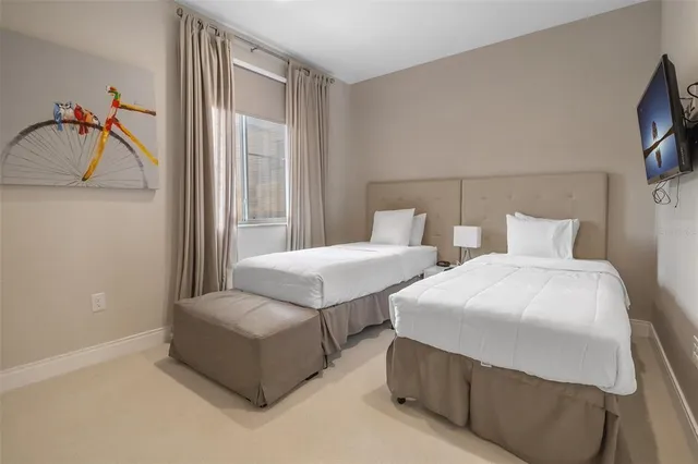 a bathroom with a granite countertop sink a toilet a mirror and shower