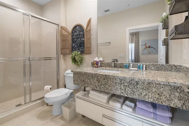 a view of a backyard with swimming pool