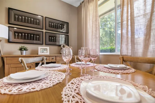 a view of a dining room with furniture