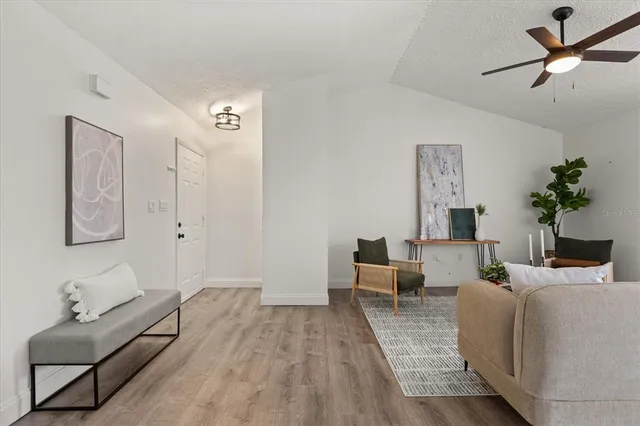 a living room with furniture and a couch