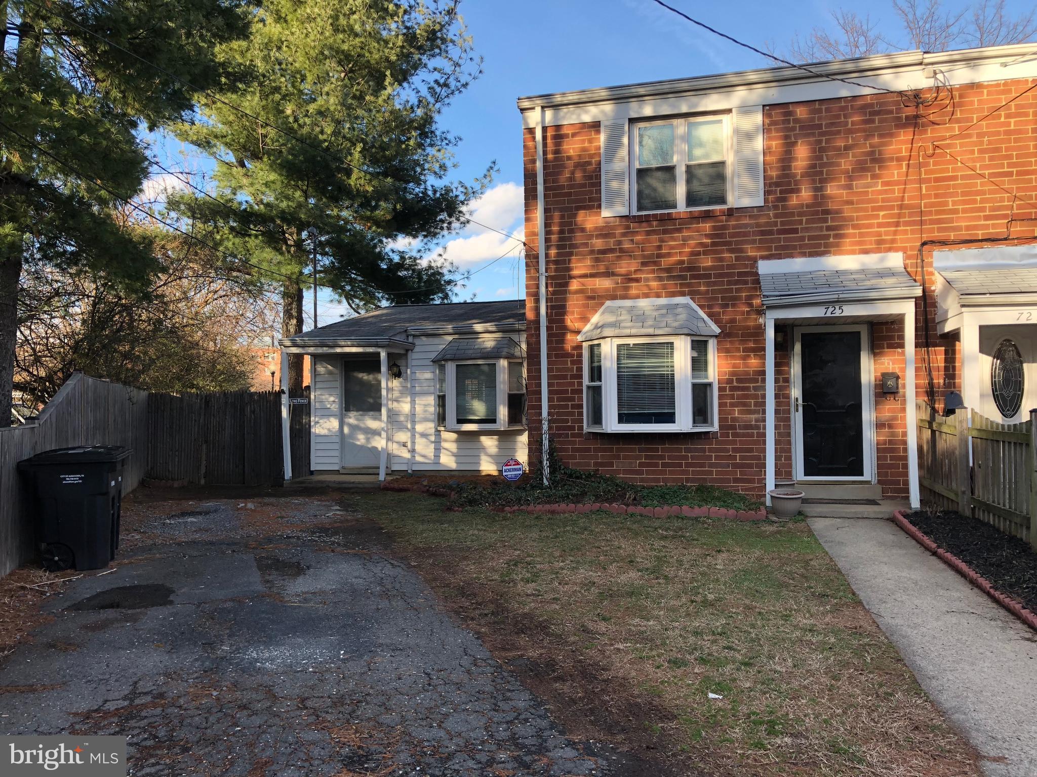 725 Four Mile Road Alexandria, VA 22305 - Photo 1 of 23 a front view of a house with yard