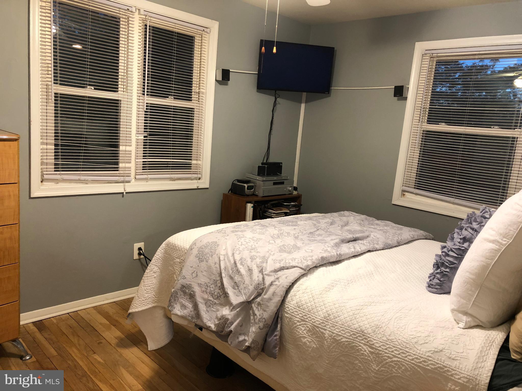 725 Four Mile Road Alexandria, VA 22305 - Photo 14 of 23 a bedroom with a bed and a window