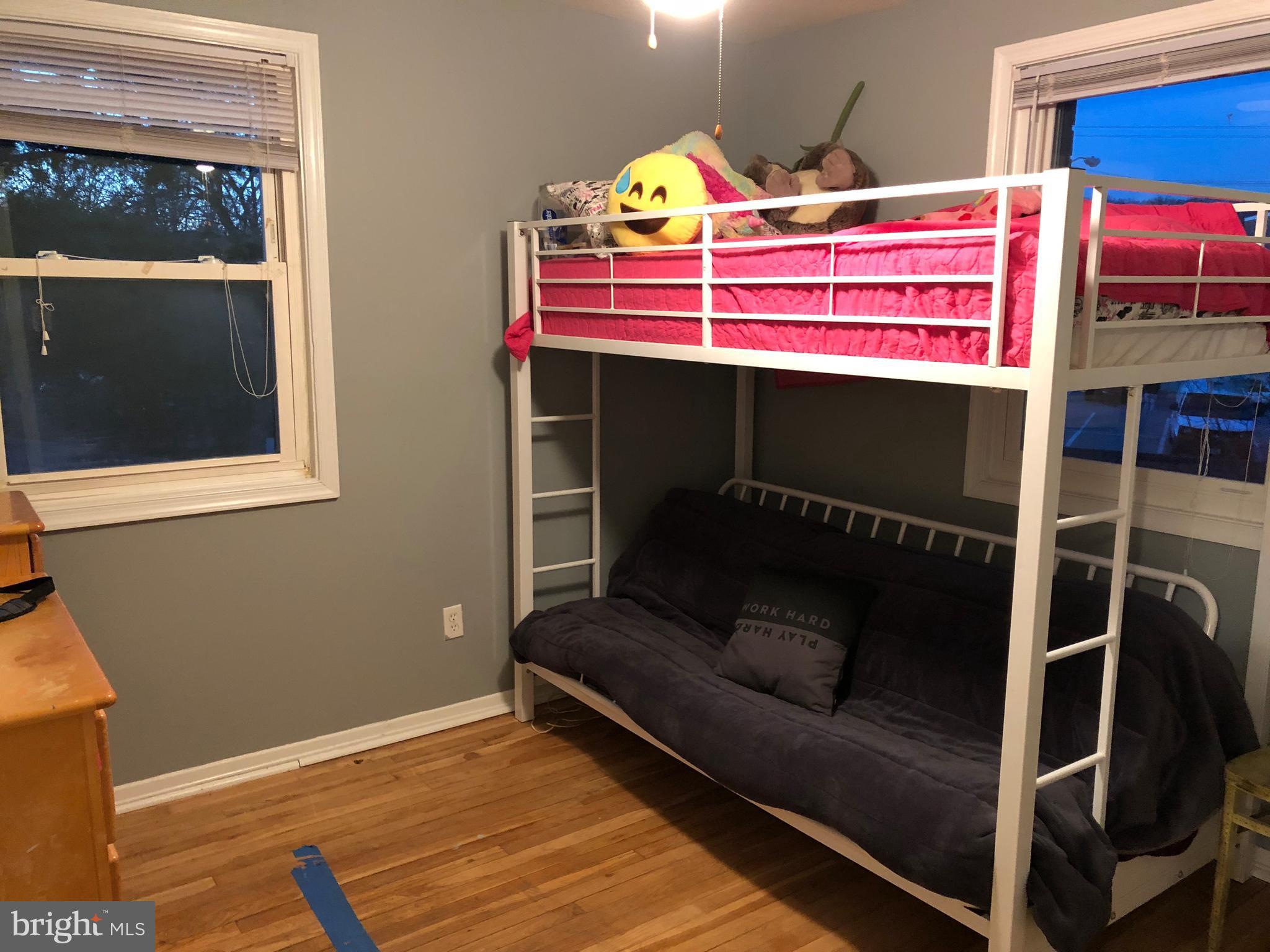 725 Four Mile Road Alexandria, VA 22305 - Photo 15 of 23 a bedroom with a bed and a window