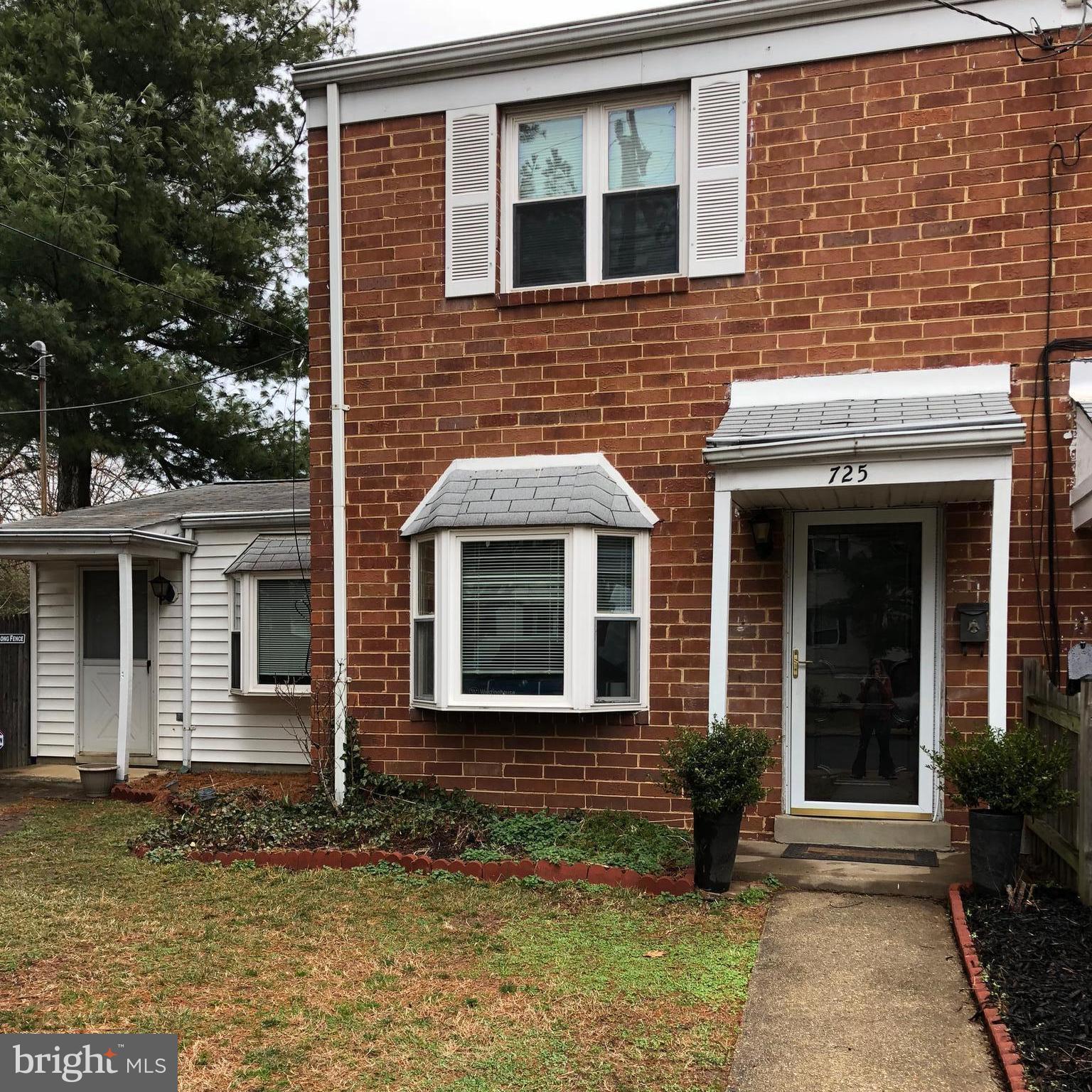 725 Four Mile Road Alexandria, VA 22305 - Photo 23 of 23 a view of a brick house with many windows