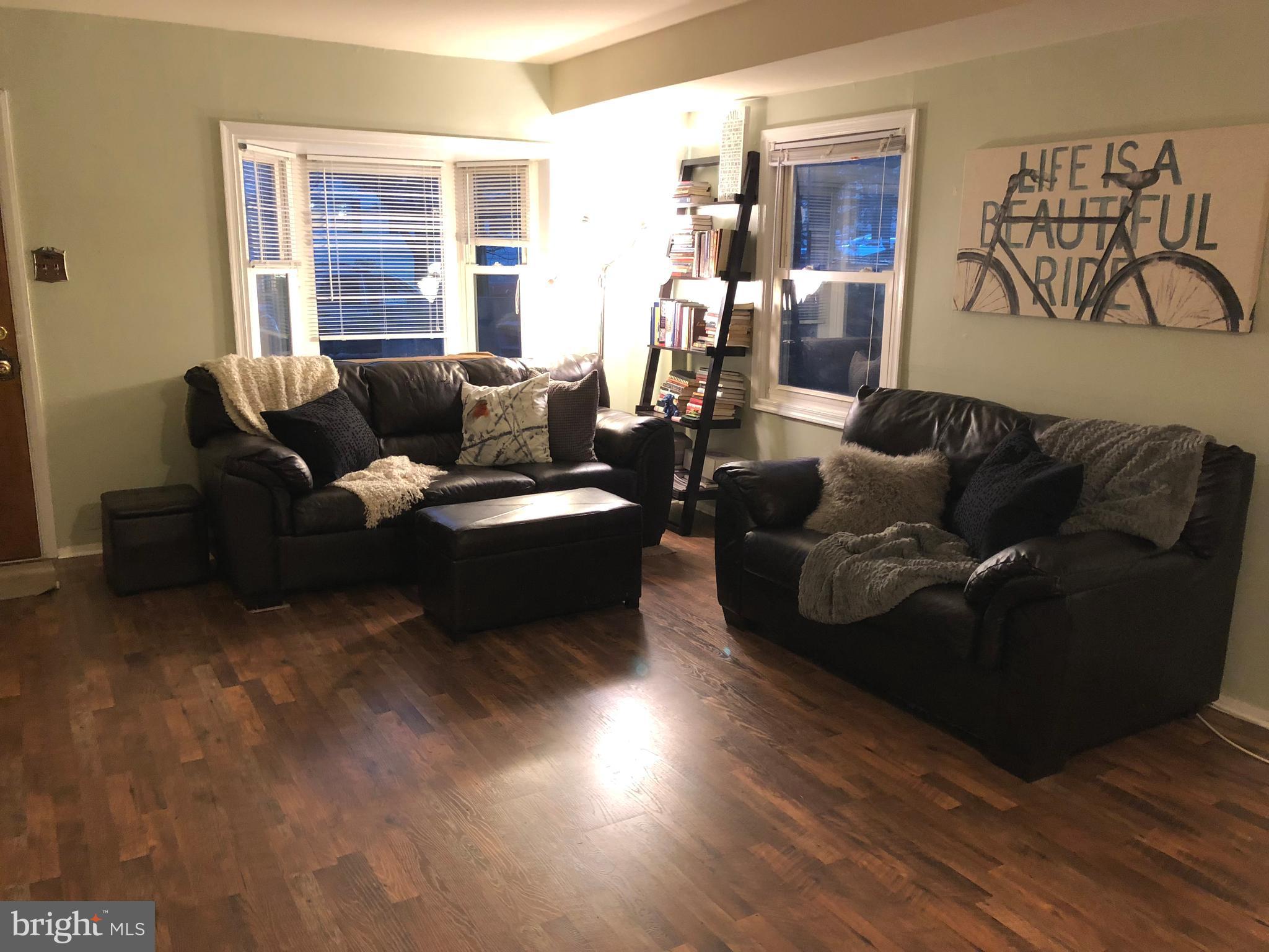 725 Four Mile Road Alexandria, VA 22305 - Photo 5 of 23 a living room with furniture window and wooden floor