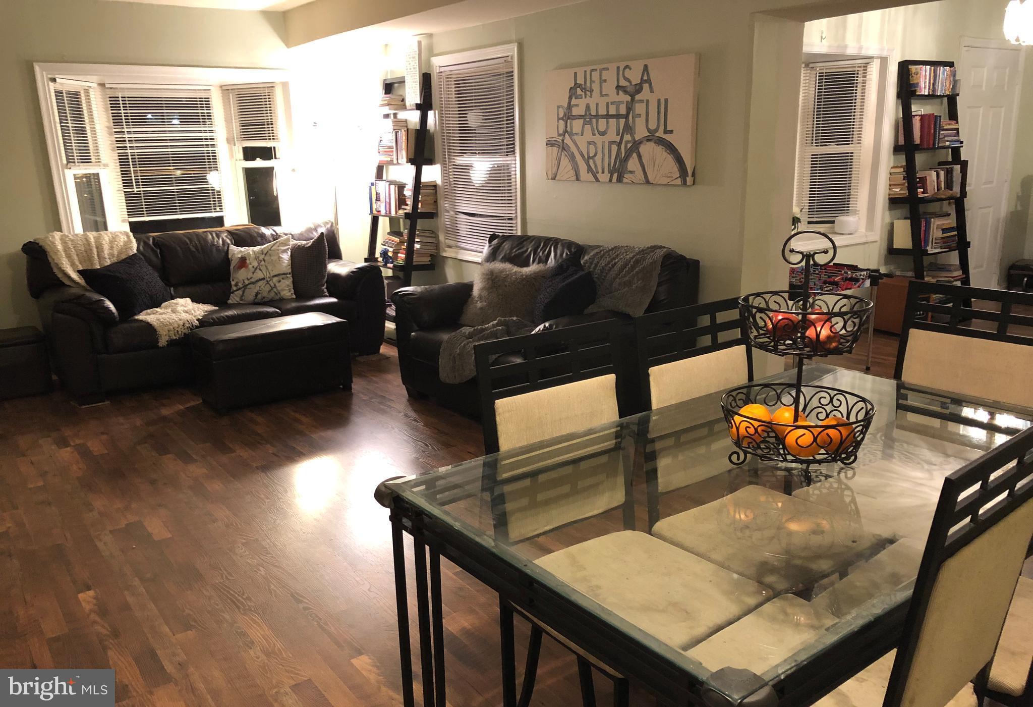 725 Four Mile Road Alexandria, VA 22305 - Photo 6 of 23 a living room with furniture and wooden floor