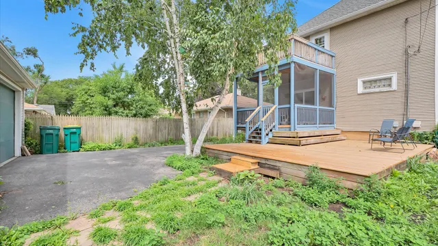 a front view of a house with garden and patio