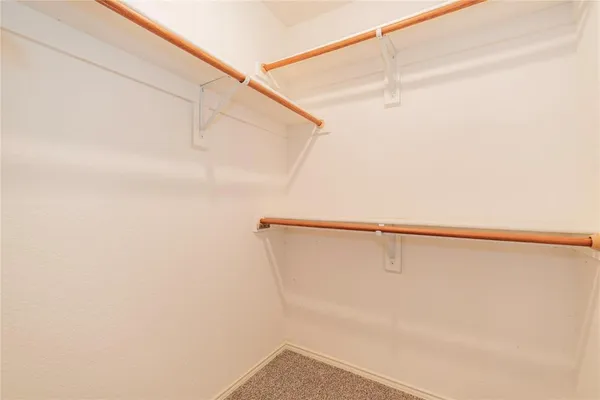 a bathroom with a shower and a shower head