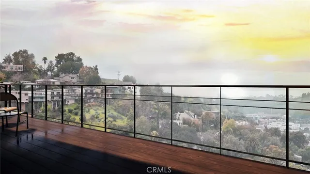 a living room with a large window and table