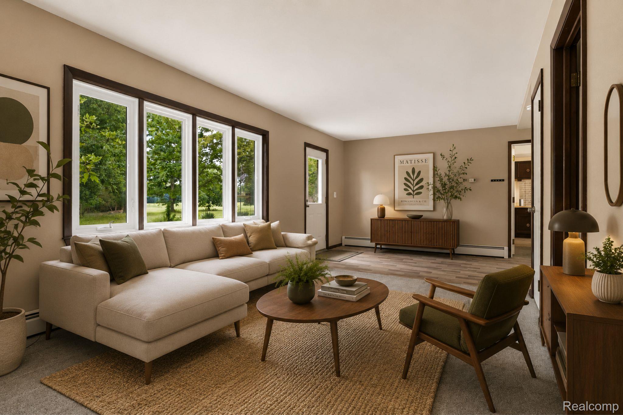 7386 Dean Road Fenton, MI 48430 - Photo 64 of 64 Expansive living area featuring multiple large windows, wood-finish flooring, and a neutral wall color