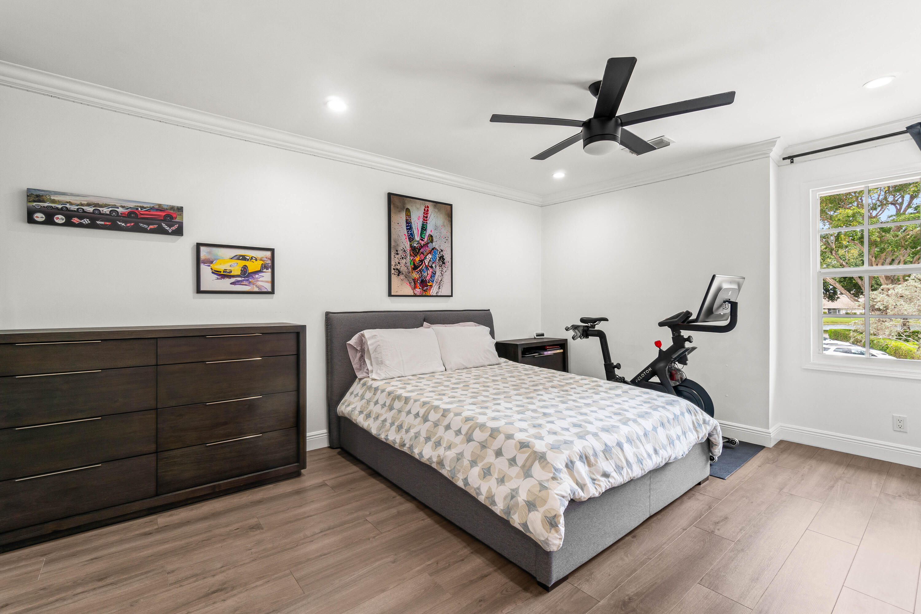 9226 Boca Gardens Parkway, Unit E Boca Raton, FL 33496 - Photo 24 of 40 a bedroom with a bed and window