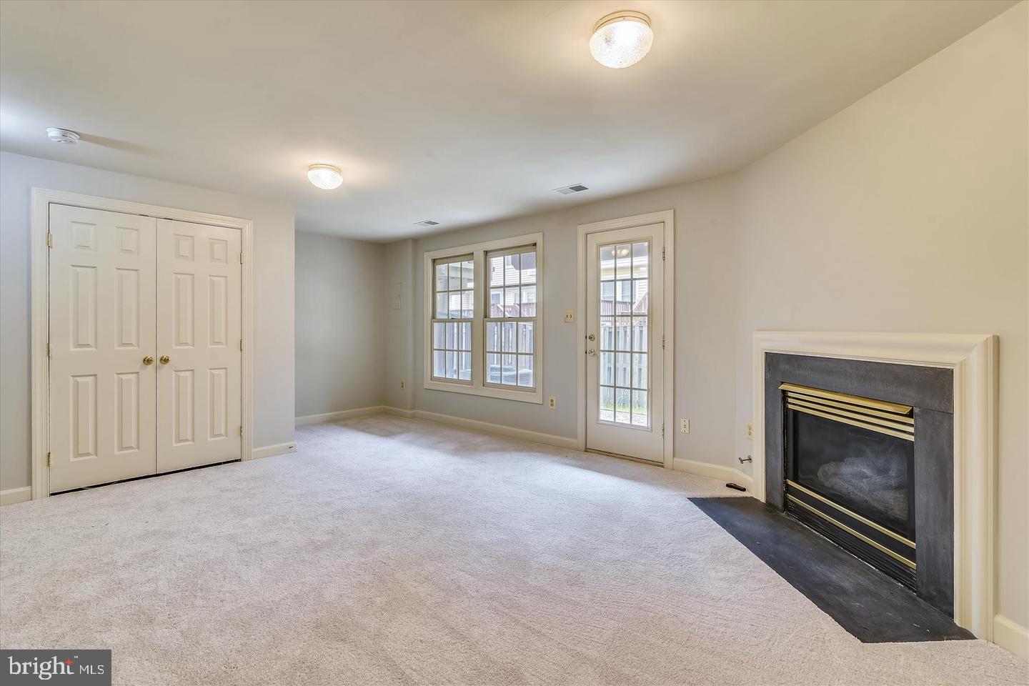 14386 Silo Valley View Centreville, VA 20121 - Photo 21 of 24 WALK OUT TO PATIO FROM LOWER LEVEL FAMILY ROOM