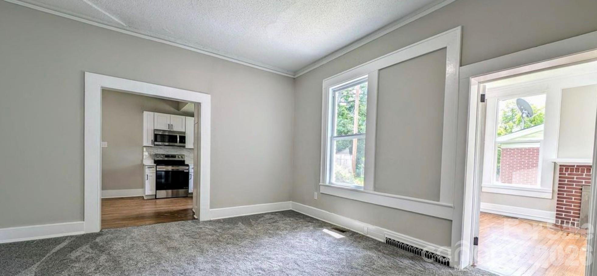 113 Brawley Street Chester, SC 29706 - Photo 10 of 12 an empty room that has a window