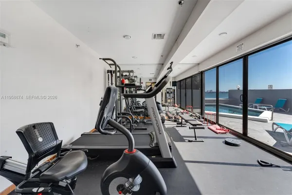 a view of a room with gym equipment