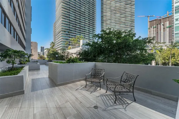 a view of backyard with furniture