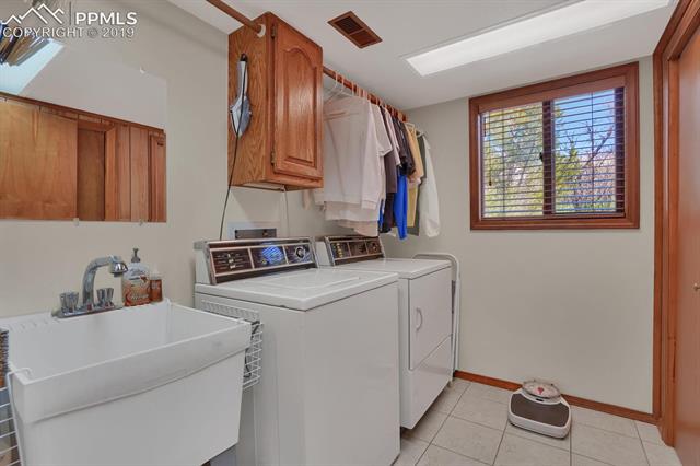 190 Desert Inn Way Colorado Springs, CO 80921 - Photo 12 of 31 Laundry with sink and 2 closets!