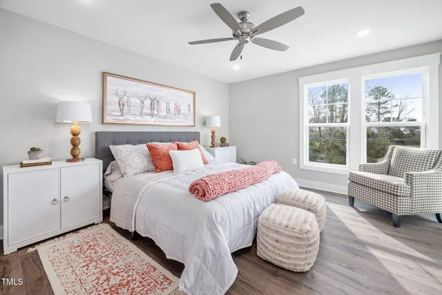 a bedroom with a bed and a couch