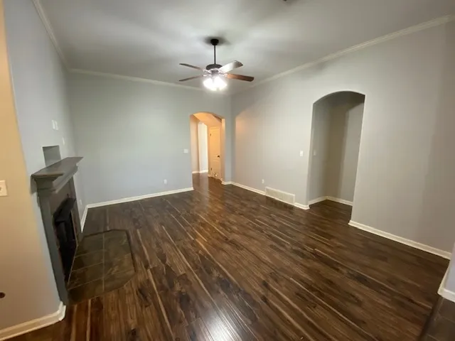 a view of livingroom with hardwood floor and ceiling fan