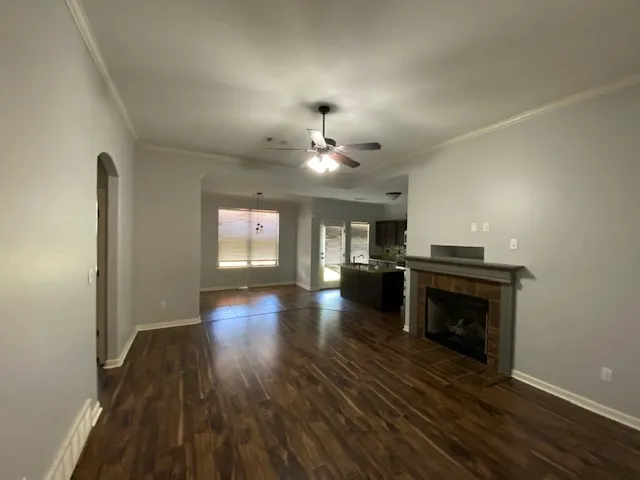 a view of a livingroom with wooden floor