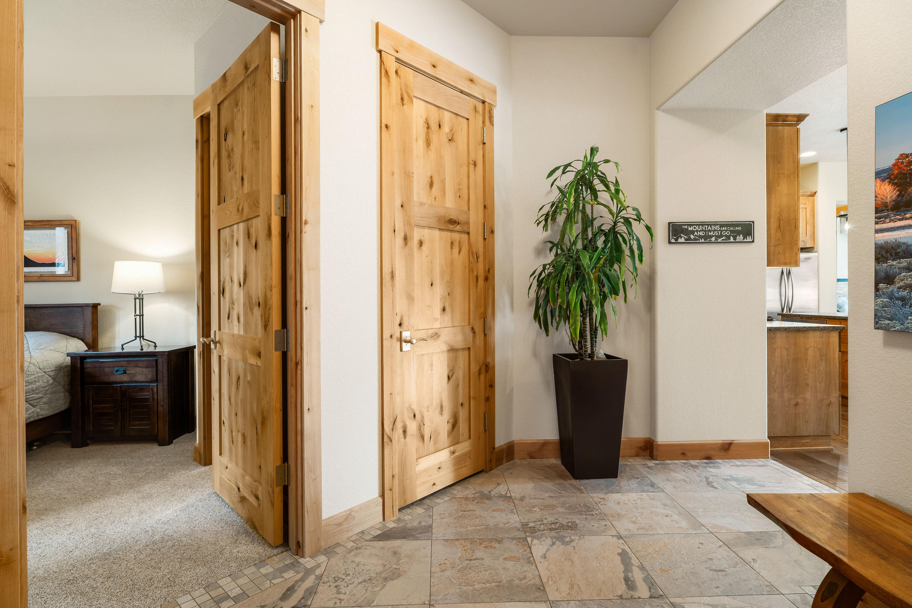 18667 Coffee Court Bend, OR 97702 - Photo 12 of 30 a view of a hallway with wooden floor and a livingroom