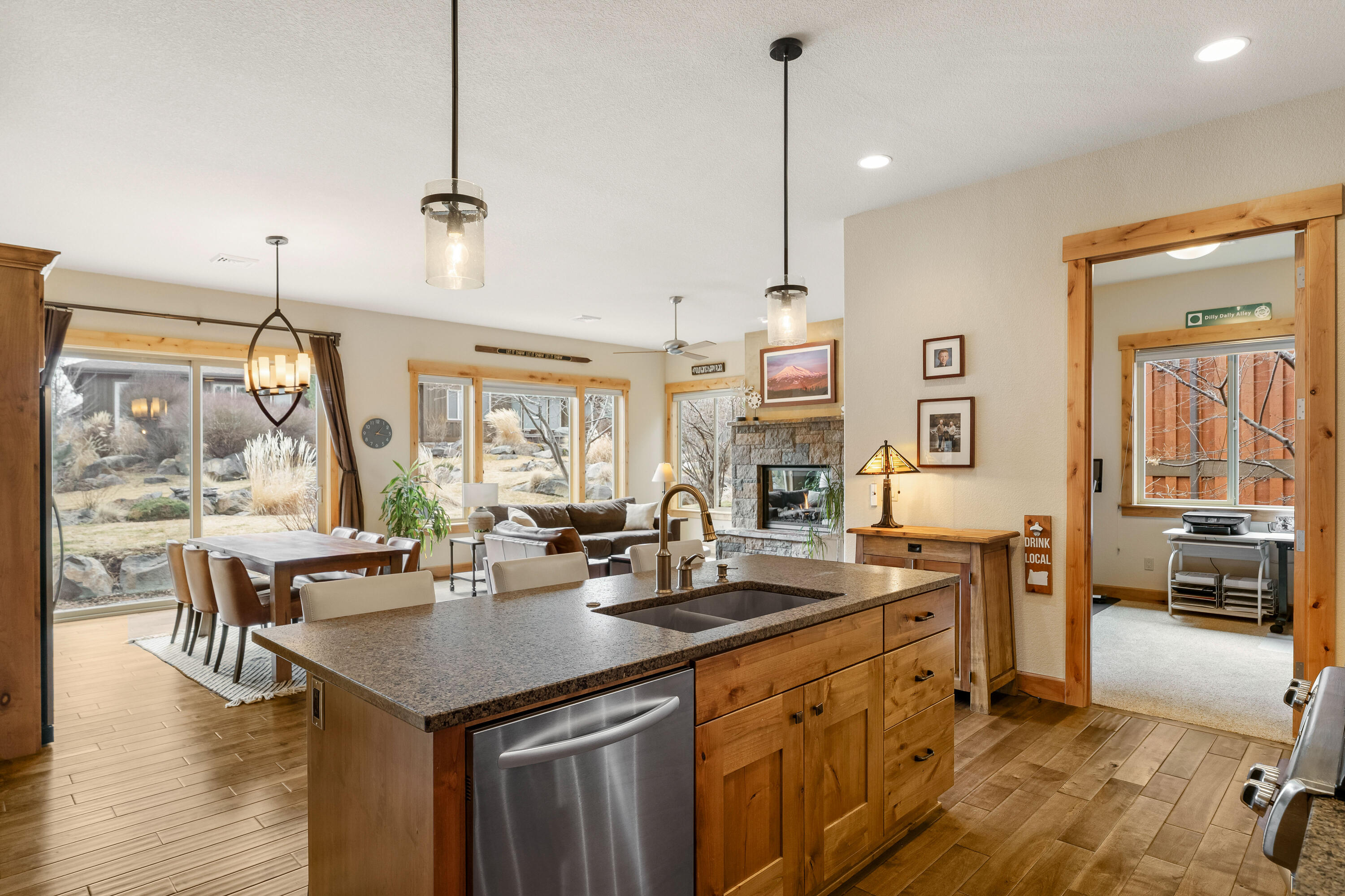 18667 Coffee Court Bend, OR 97702 - Photo 18 of 30 a open kitchen with stainless steel appliances granite countertop a sink and cabinets