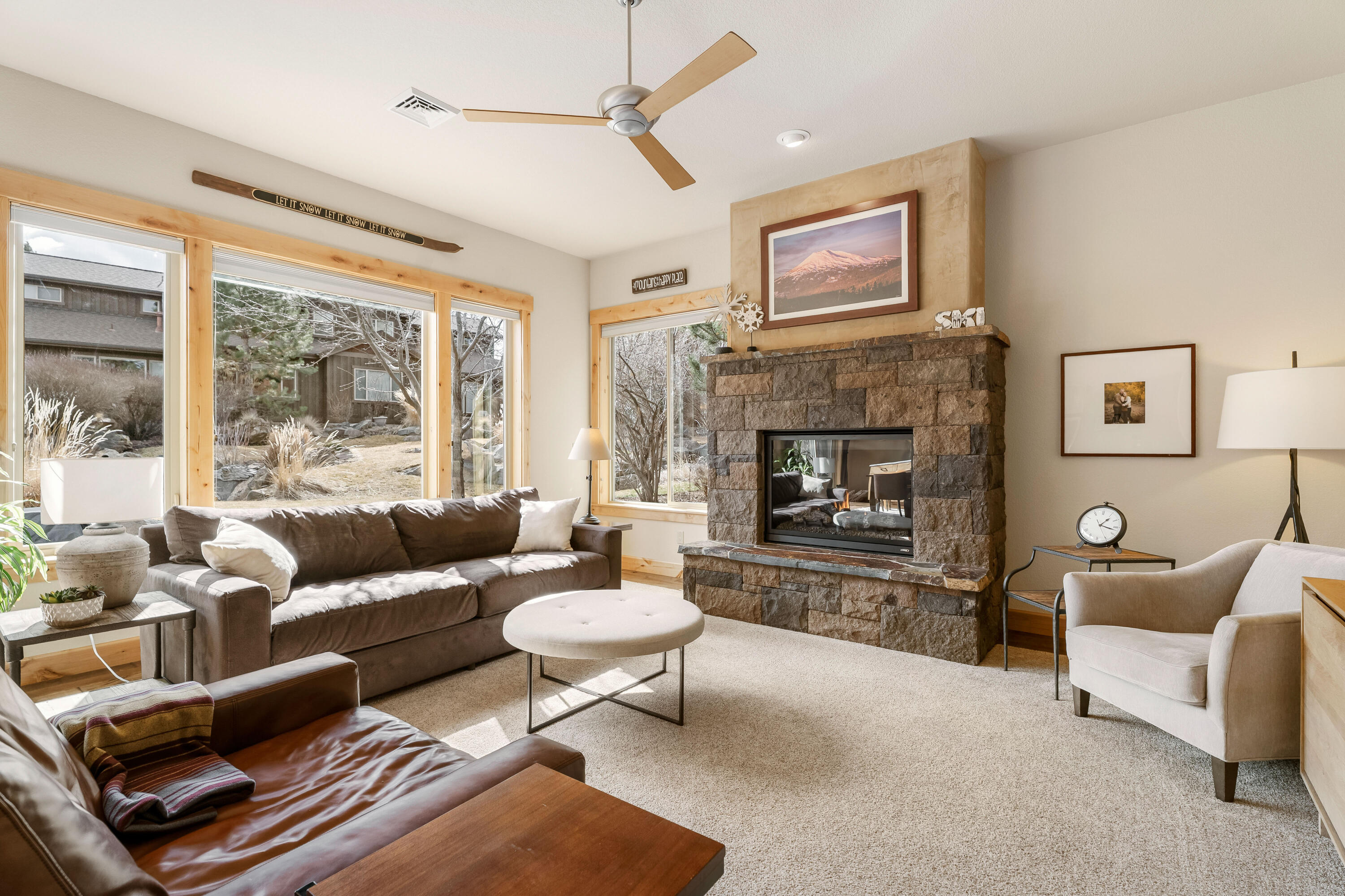 18667 Coffee Court Bend, OR 97702 - Photo 20 of 30 a living room with furniture and a fireplace