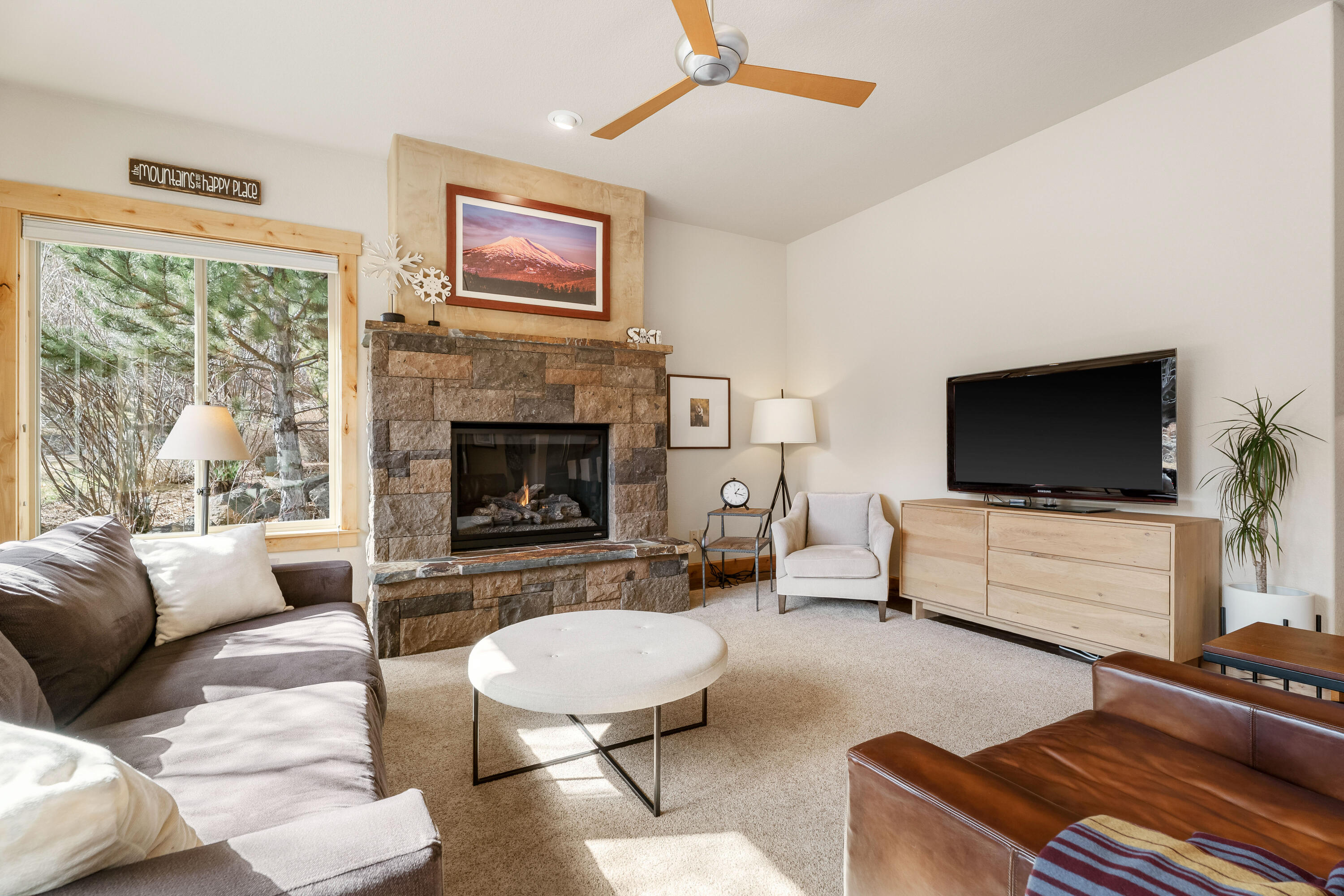 18667 Coffee Court Bend, OR 97702 - Photo 21 of 30 a living room with furniture and a flat screen tv