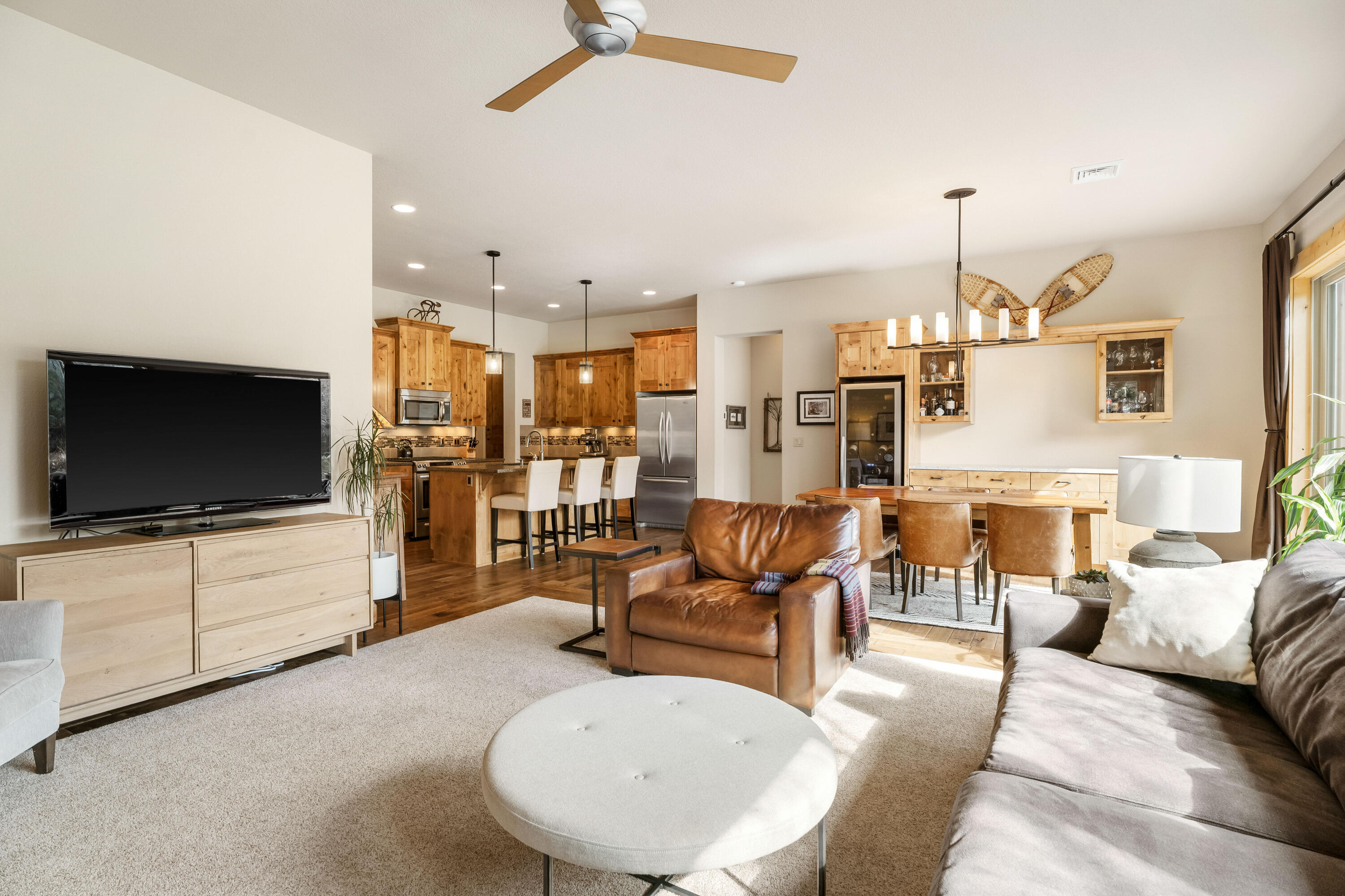 18667 Coffee Court Bend, OR 97702 - Photo 22 of 30 a living room with furniture and a flat screen tv