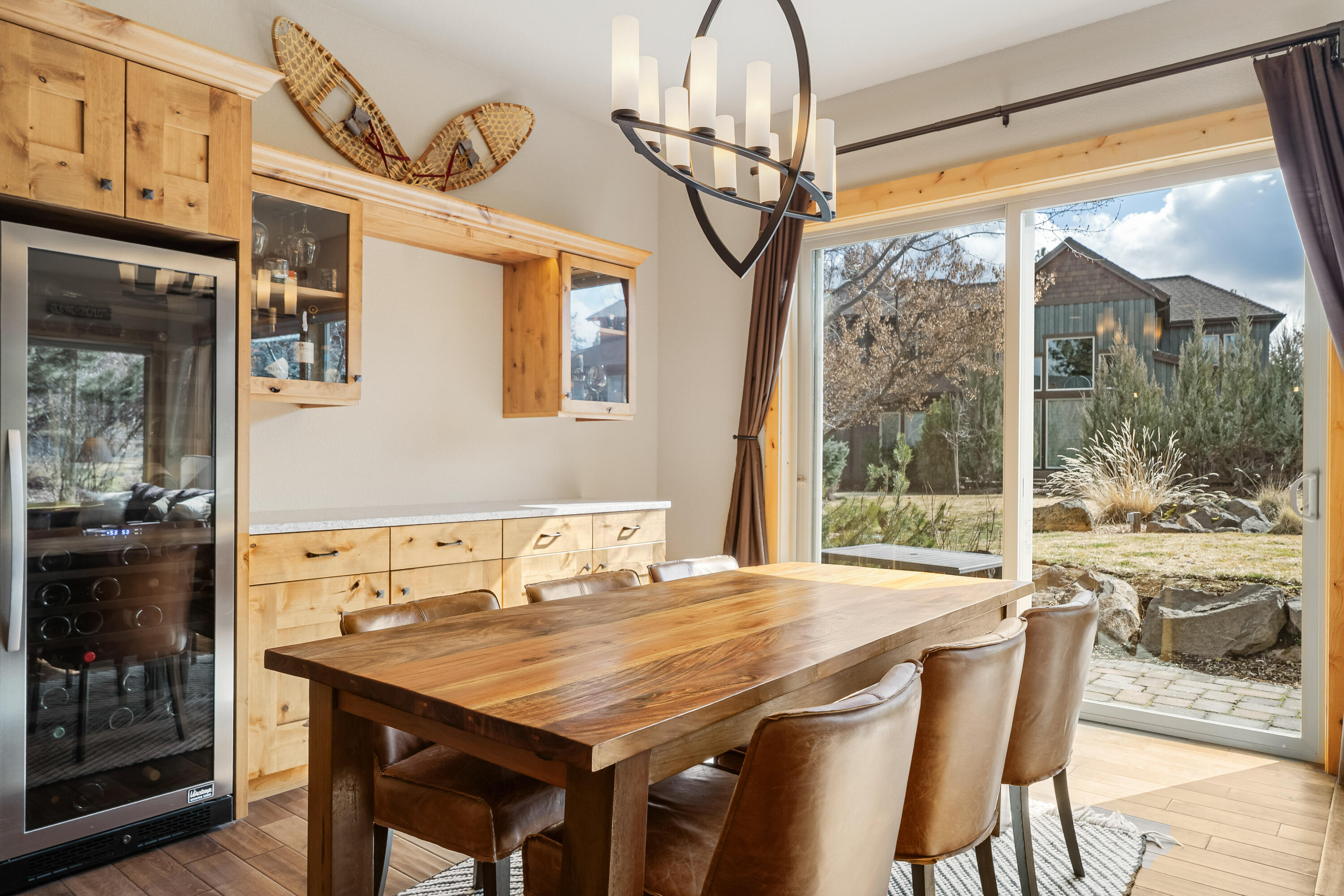 18667 Coffee Court Bend, OR 97702 - Photo 23 of 30 a dining room with stainless steel appliances a table and chairs