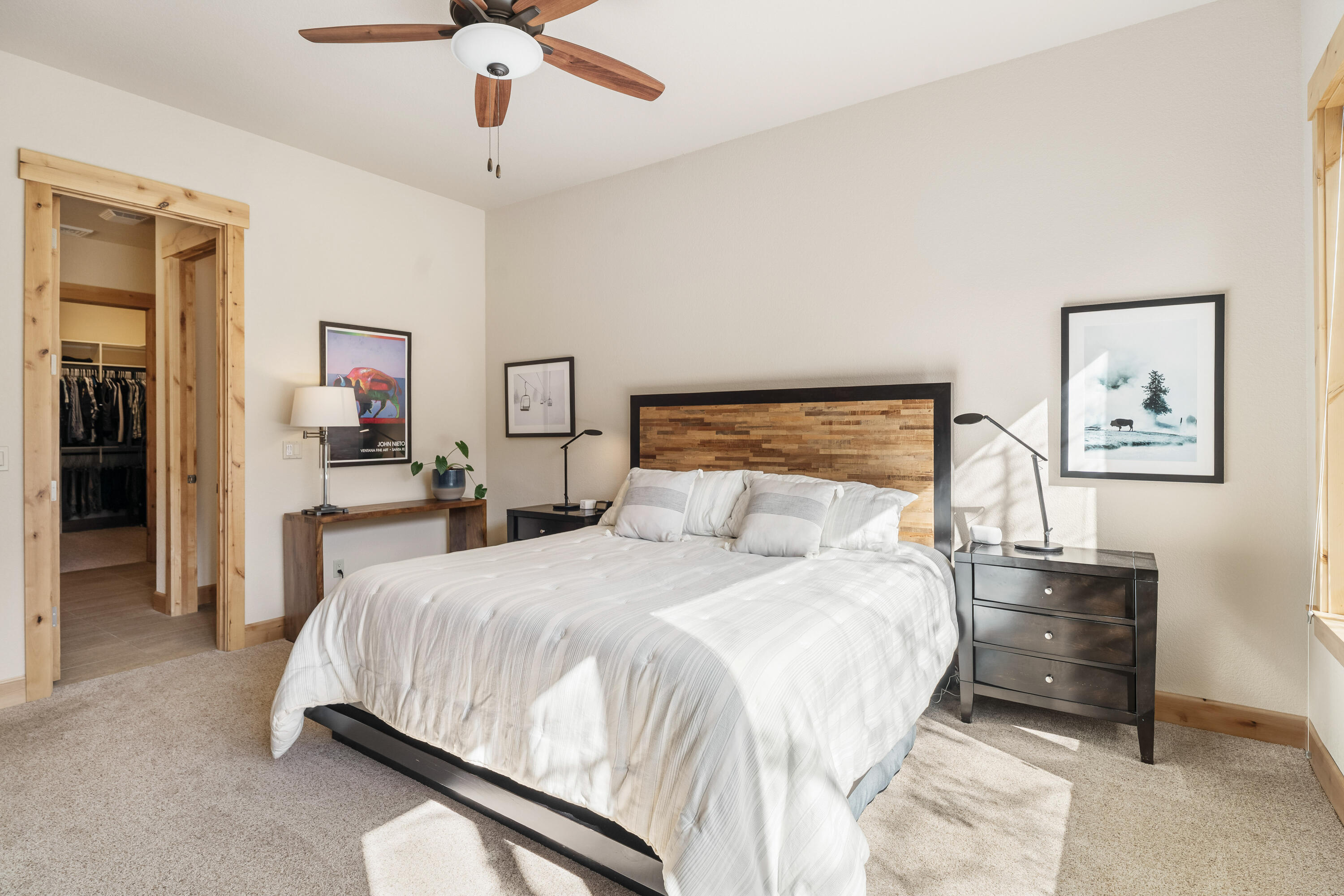18667 Coffee Court Bend, OR 97702 - Photo 25 of 30 a bedroom with a bed and ceiling fan