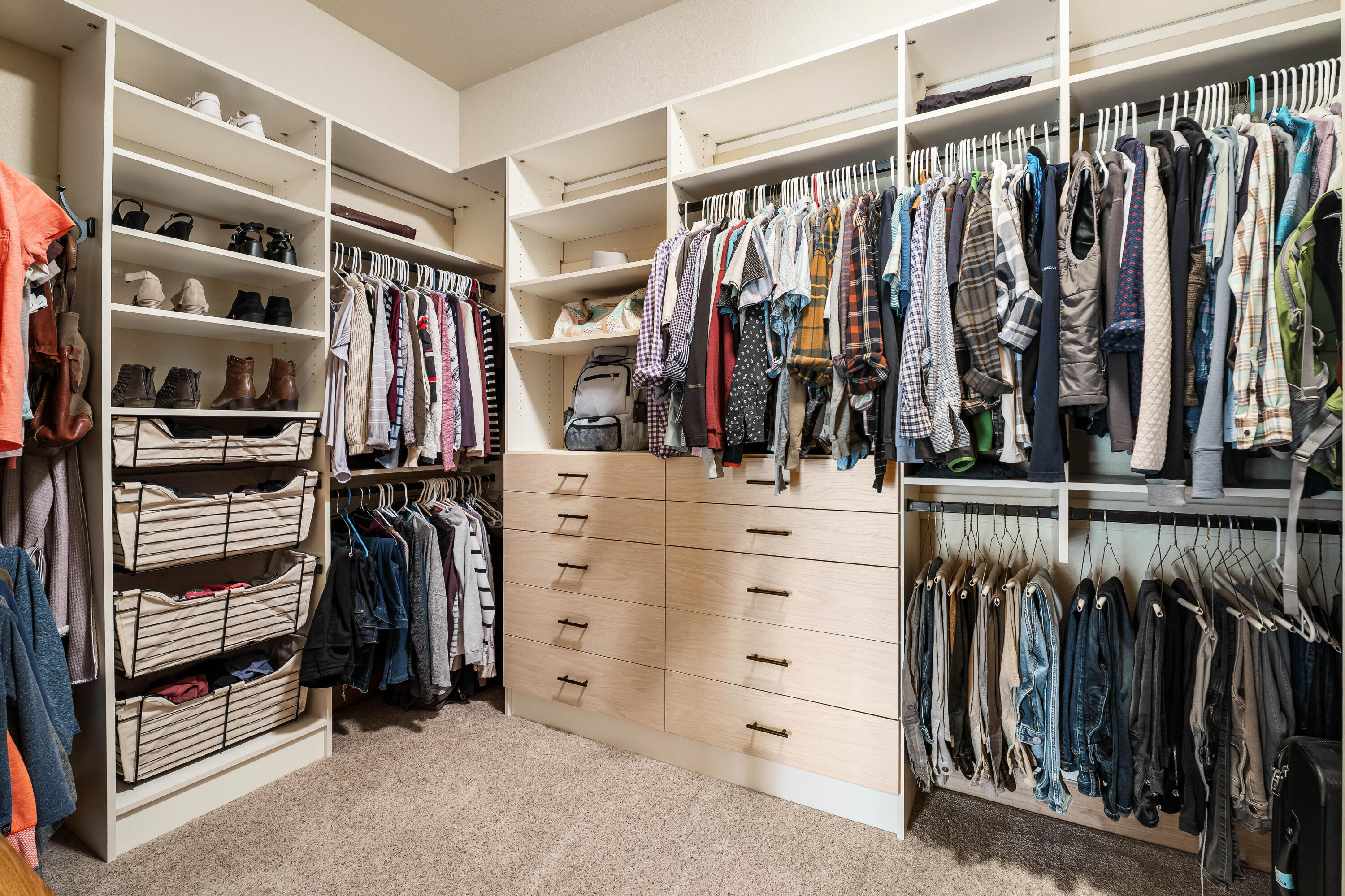 18667 Coffee Court Bend, OR 97702 - Photo 28 of 30 a view of walk in closet with clothes and shoes