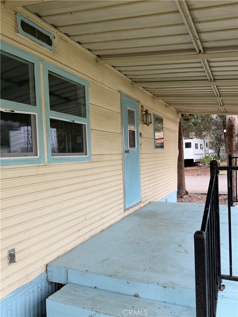 5877 Lake Street, Unit 23 Lucerne, CA 95458 - Photo 17 of 19 a view of a porch