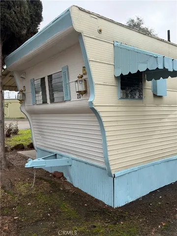 a view of a back yard of the house