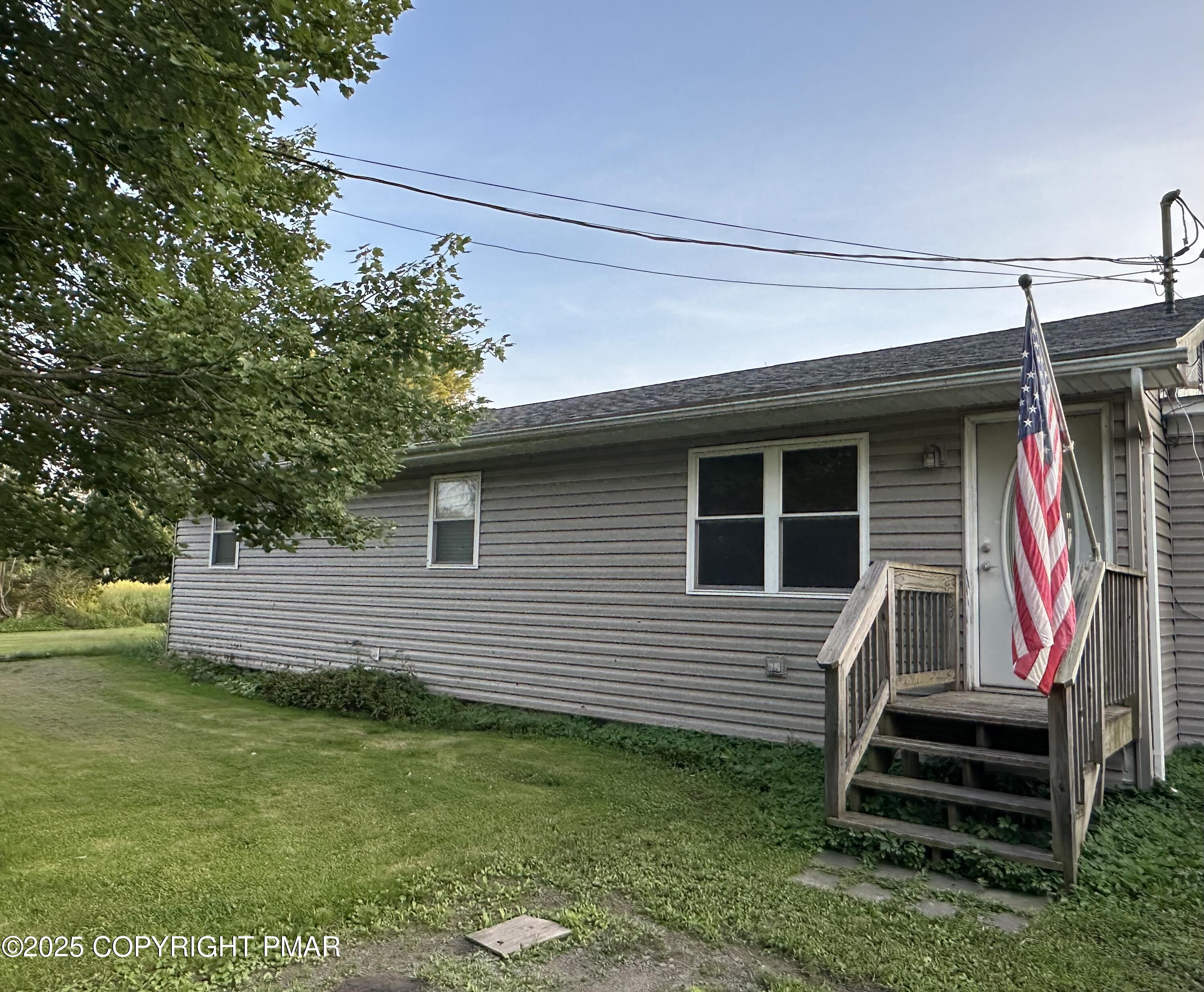 2748 Locust Ridge Road Pocono Lake, PA 18347 - Photo 2 of 17 Front