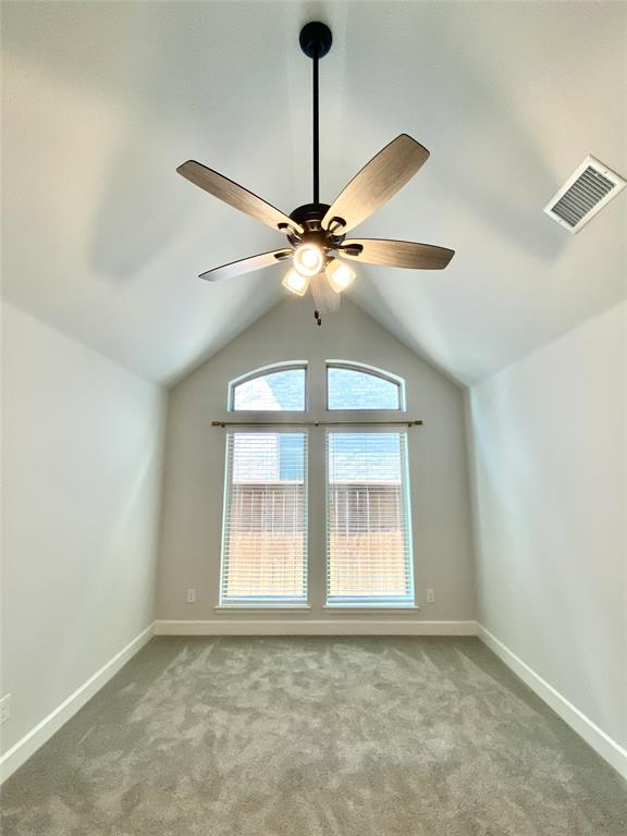 1937 Halkin Road Celina, TX 75009 - Photo 16 of 20 Spacious bonus room featuring a ceiling fan and French glass doors