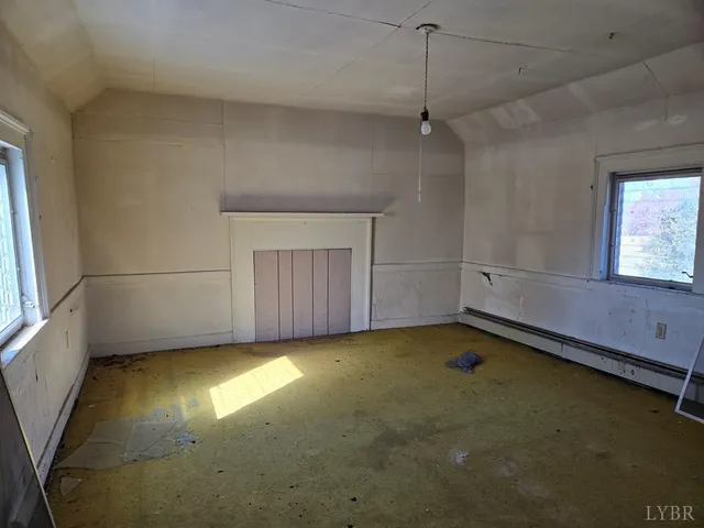 an empty room with windows